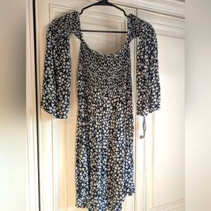 Long sleeve, off shoulder, Billabong Black and White dress. Size XS.